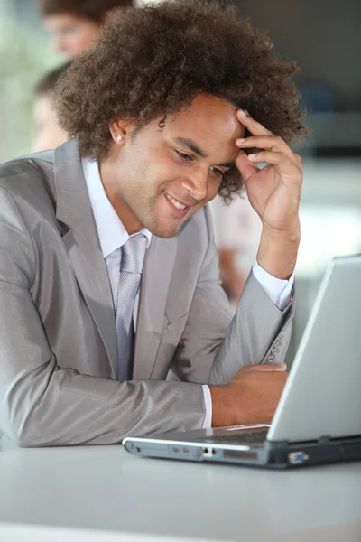 Happy businessman in the office — Stock Photo, Image