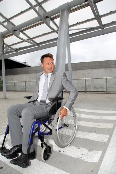 Businessman in wheelchair — Stock Photo, Image