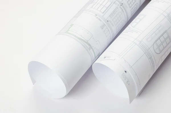 Stock image Architectural plans in rolls