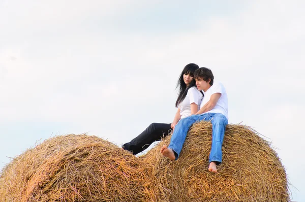 stock image A young couple in the manger