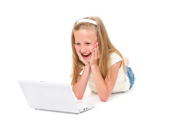 stock image Happy little girl with laptop