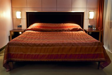 Bedroom in five-star hotel clipart