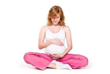 Close-up of a pregnant woman sitting clipart