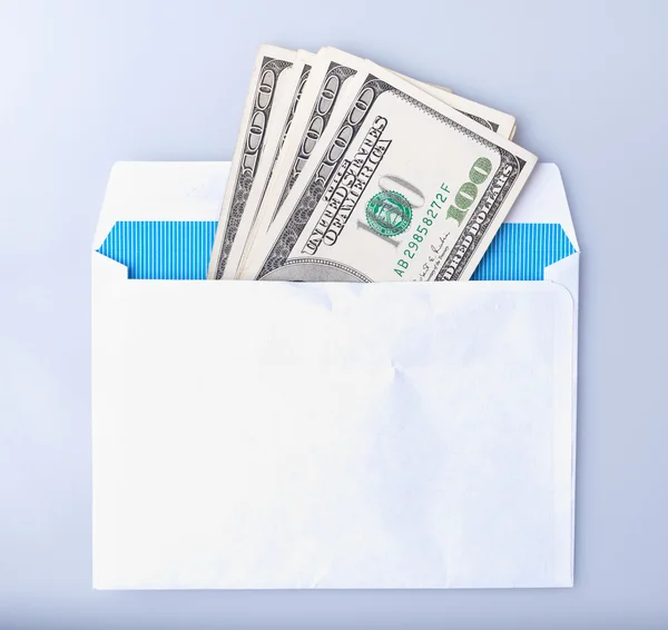 Nota de dólares no envelope — Fotografia de Stock