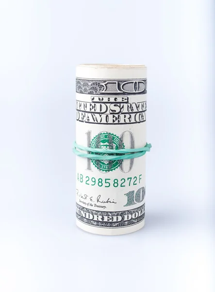 Rolo de dólares isolado em um fundo branco — Fotografia de Stock