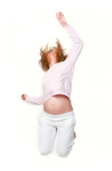 Jovem mulher grávida se divertindo — Fotografia de Stock