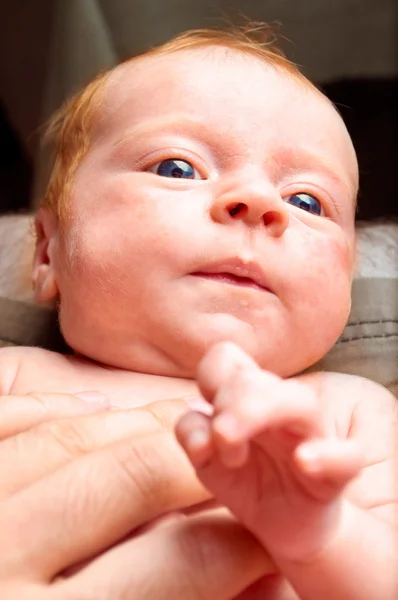 Närbild av en baby ansikte — Stockfoto