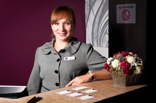 Receptionist at the reception desk — Stock Photo, Image