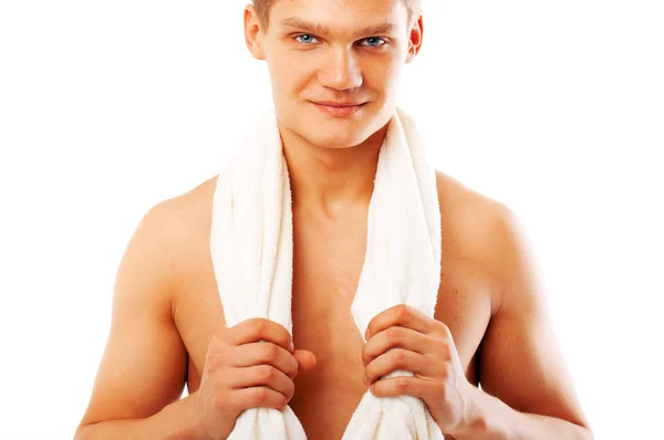 Retrato de um jovem segurando toalha branca — Fotografia de Stock