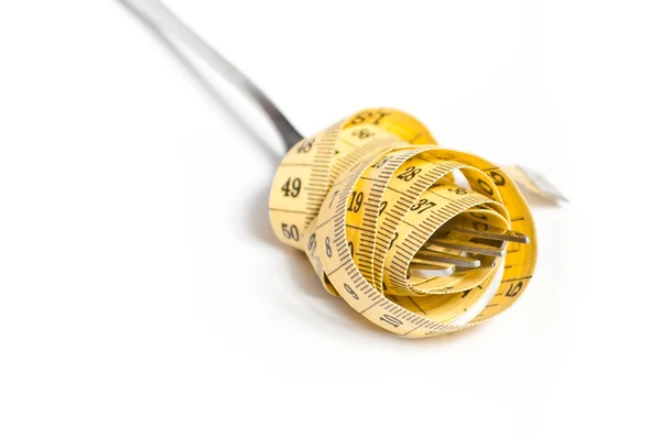 Bir çatal kavramı üzerinde ölçüm bandı — Stok fotoğraf