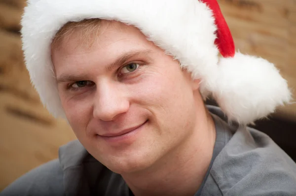 Stock image Portrait of young male with Santa Claus hat