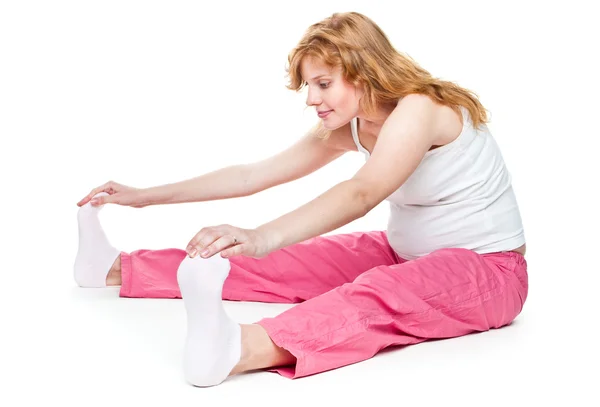 Pregnant woman making fitness exercises — Stock Photo, Image