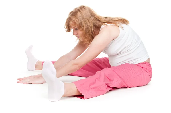 Schwangere macht Fitnessübungen — Stockfoto