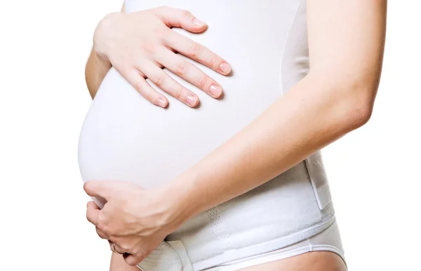 Detail mladé těhotné ženy s korzetem — Stock fotografie