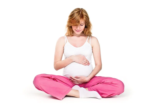 Gros plan d'une femme enceinte assise Photos De Stock Libres De Droits