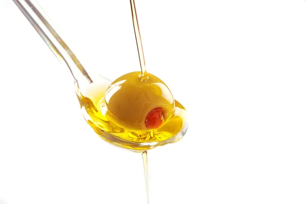 A spoon with an olive — Stock Photo, Image