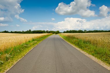 A road and blue sky clipart