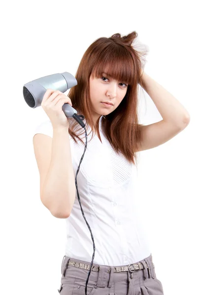 A young woman with a hairdryer — Stock Photo, Image