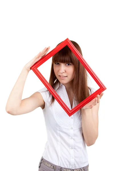 A young woman is holding an empty frame — Stock Photo, Image