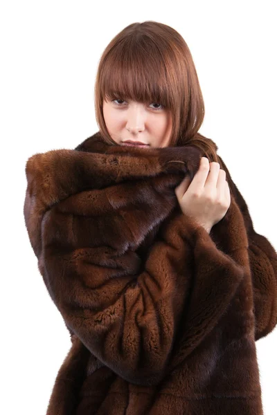 The beautiful woman in a mink fur coat — Stock Photo, Image