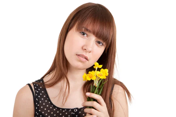 stock image The beautiful girl with a bouquet of yellow flowers