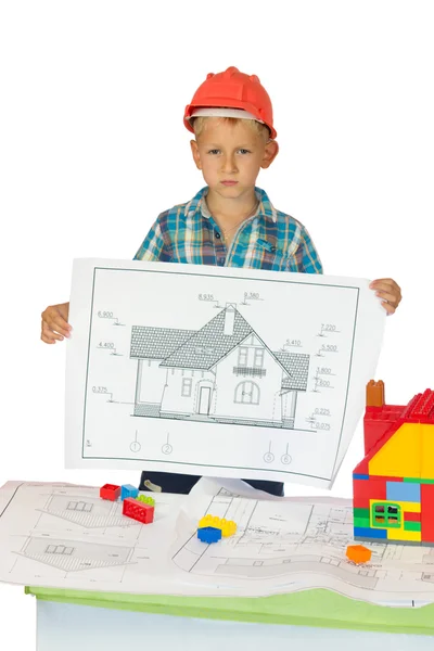 Boy in orange helmet with house drawing — Stock Photo, Image