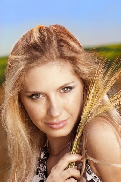 stock image A girl in a wheat field