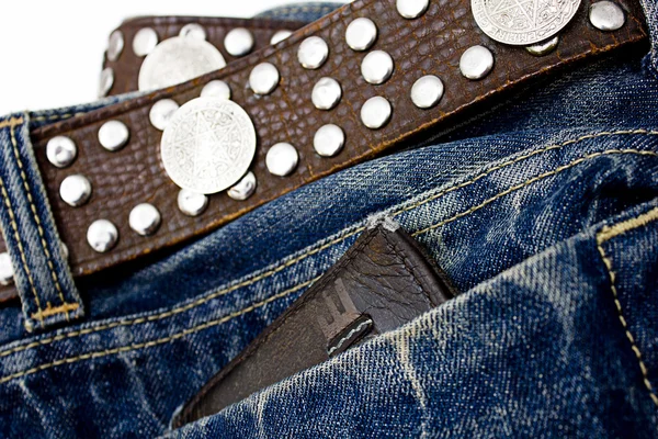 Pantalones vaqueros azules con una billetera que sobresale Fotos de stock libres de derechos