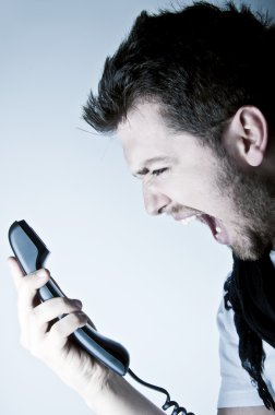 Man shouting on the phone clipart