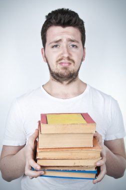 Sad student holding books clipart