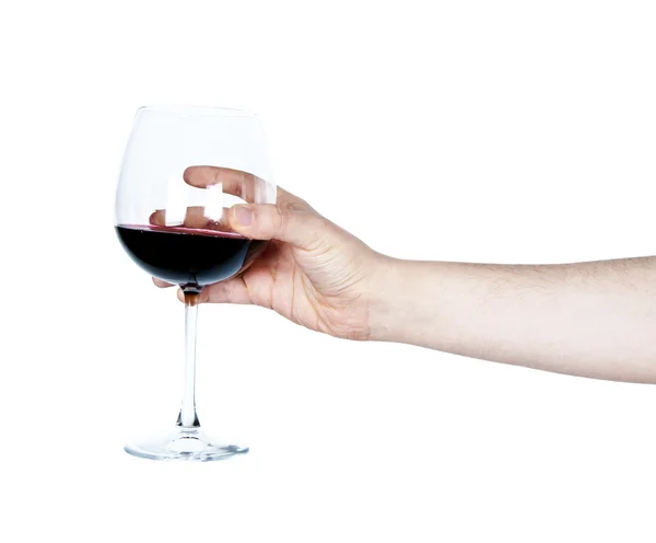 Mão segurando um copo de vinho tinto — Fotografia de Stock