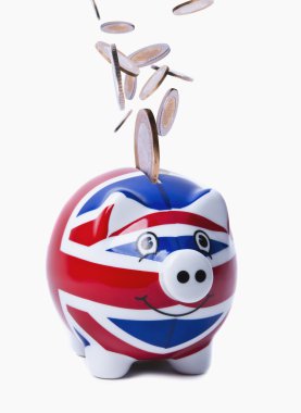 Coins Raining into UK Piggybank clipart