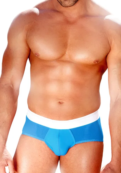 水色の水着で筋肉質の男 — ストック写真