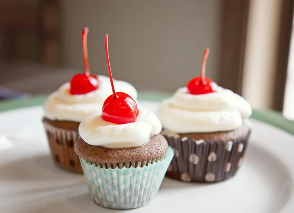 Três cupcakes — Fotografia de Stock