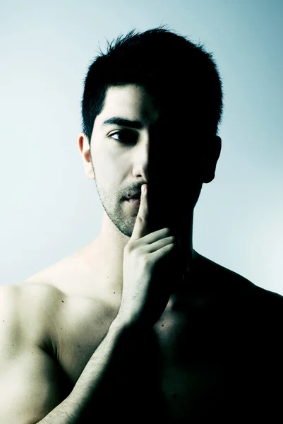 Sexy man in silence gesture — Stock Photo, Image