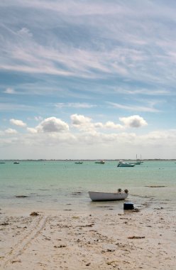 Boat on seacoast in Cancale, Brittany, France clipart