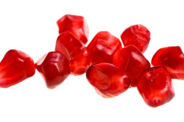 Separate grains of pomegranate clipart