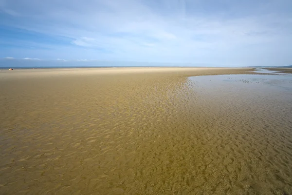 Sand beach and blue sky — Stock Photo, Image
