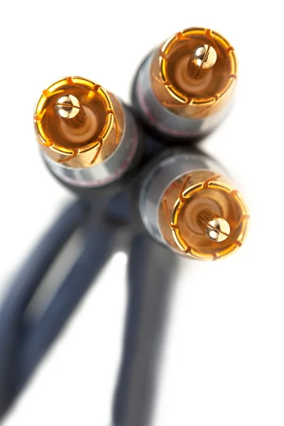 Three gold plugs close-up — Stock Photo, Image