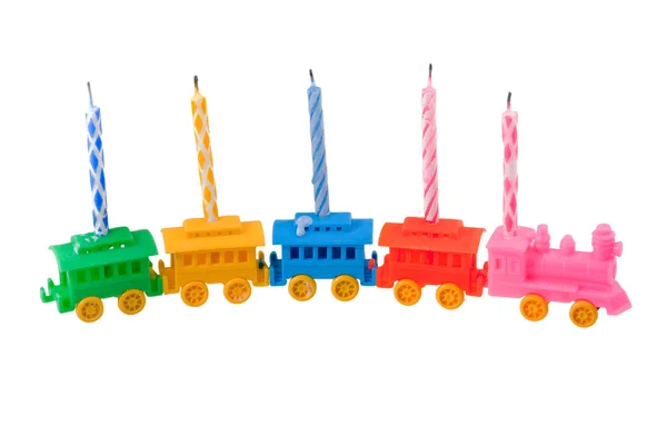 Trem de brinquedo com velas comemorativas — Fotografia de Stock