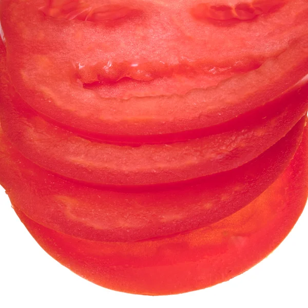 Skivad röd tomat på nära håll — Stockfoto