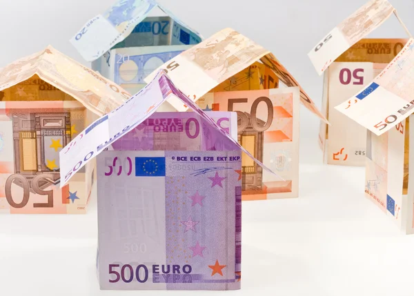 Stock image Expensive houses from euro banknotes