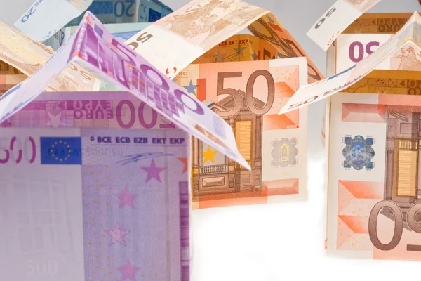 Casas caras de billetes en euros — Foto de Stock