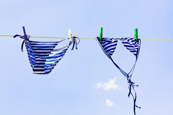Drying woman swimsuit — Stock Photo, Image