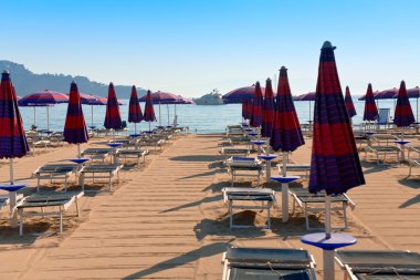 Sand beach in Giardini Naxos clipart