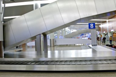 Baggage claim area in airport clipart