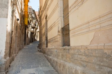 Narrow street in Syracuse, Sicily clipart