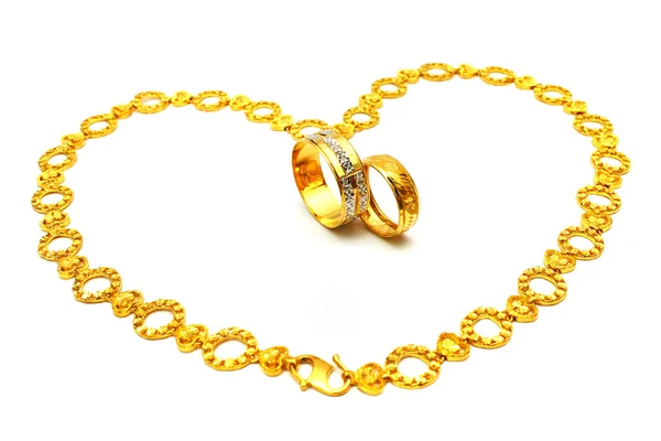 Gouden paar ring en ketting — Stockfoto
