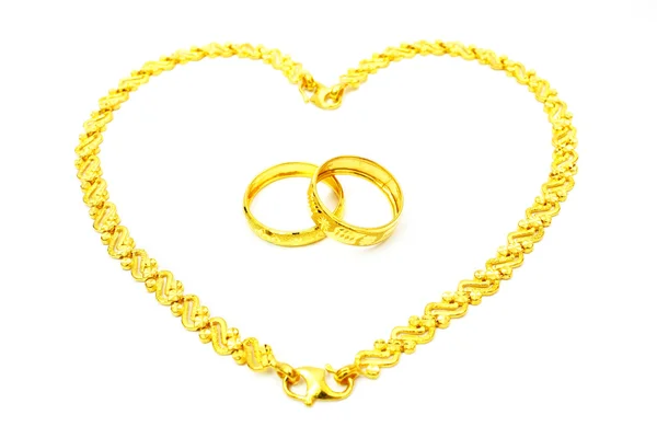 Кольцо золотой пары и браслет — стоковое фото