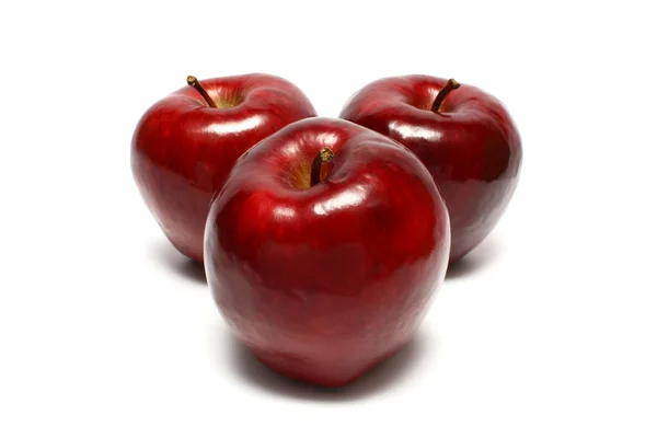 Tres manzanas rojas Imágenes de stock libres de derechos